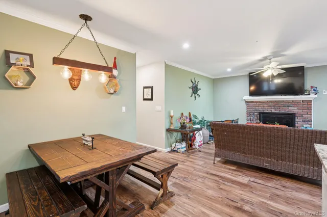 a living room with granite countertop furniture and fireplace
