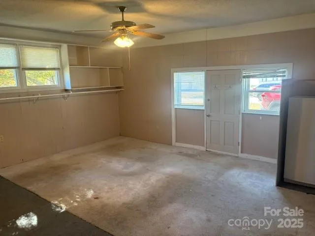 a bathroom with a sink and a granite counter top