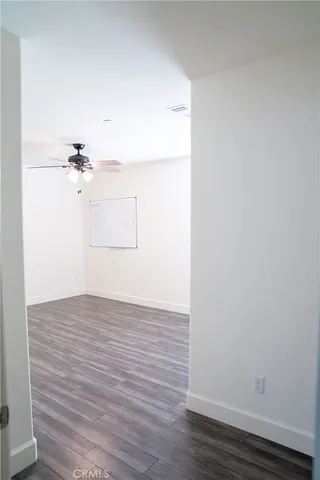 a bathroom with double vanity sink and a mirror