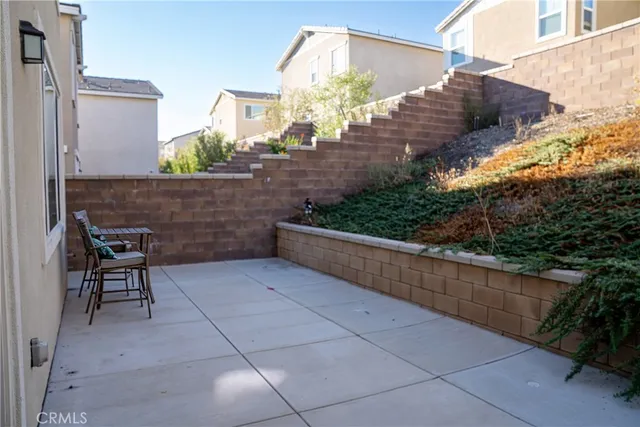 a view of a swimming pool and lounge chair