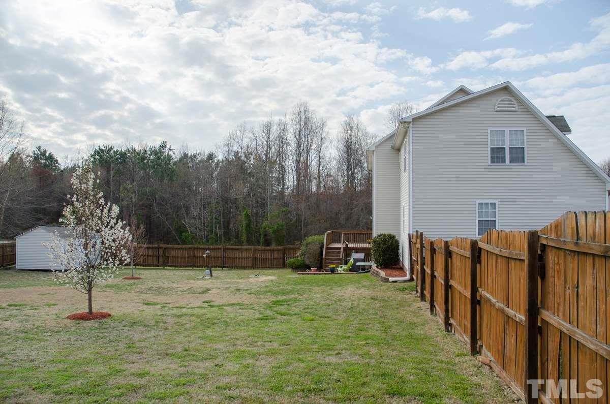 1104 Linden Crest Road Raleigh, NC 27603 - Photo 22 of 25 View of the backyard from the fence to show how spacious it is!