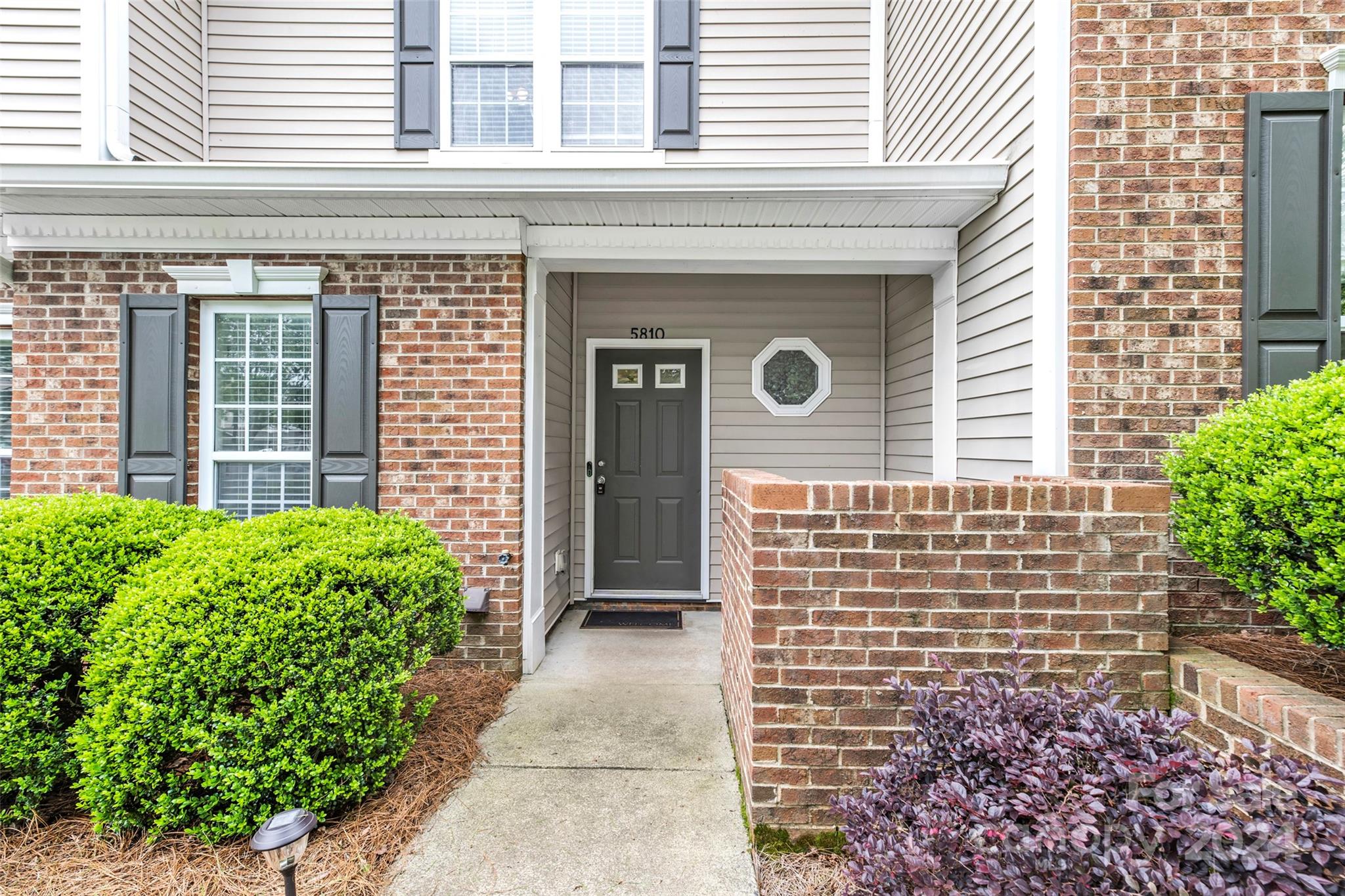 5810 Fox Ridge Lane Winston-Salem, NC 27104 - Photo 1 of 30 a front view of a house