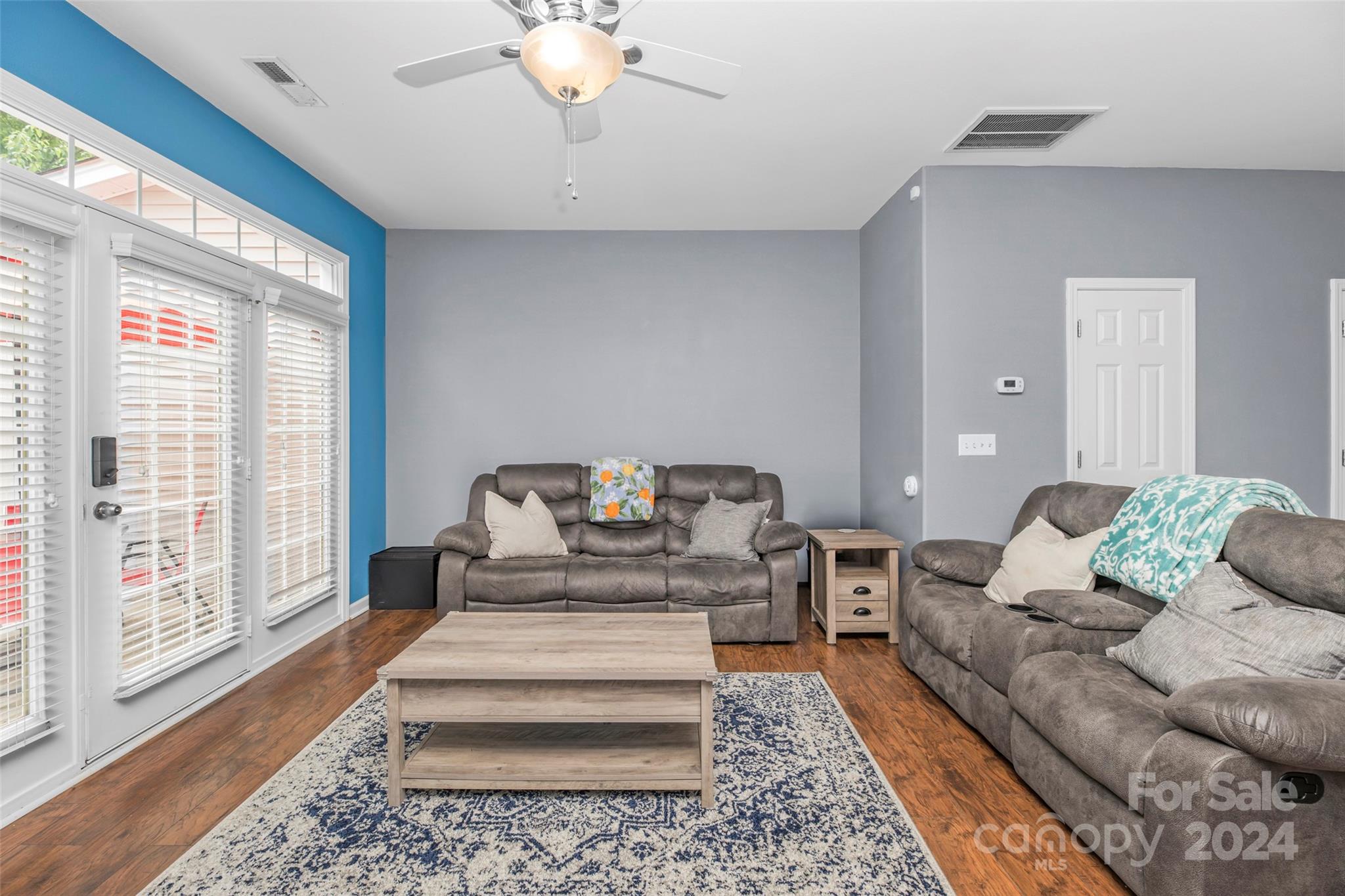 5810 Fox Ridge Lane Winston-Salem, NC 27104 - Photo 13 of 30 a living room with furniture and a large window