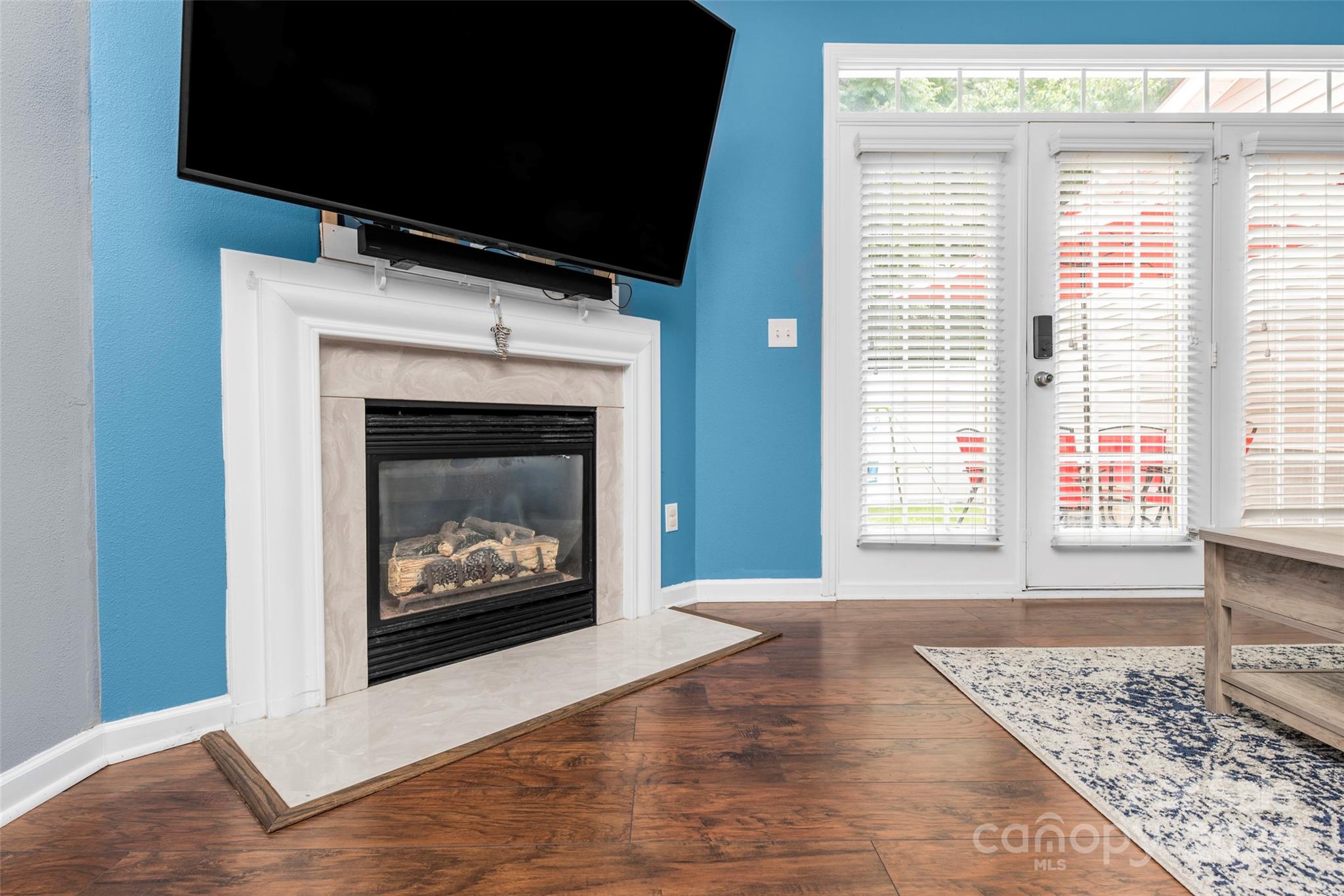 5810 Fox Ridge Lane Winston-Salem, NC 27104 - Photo 14 of 30 a living room with furniture and a fireplace