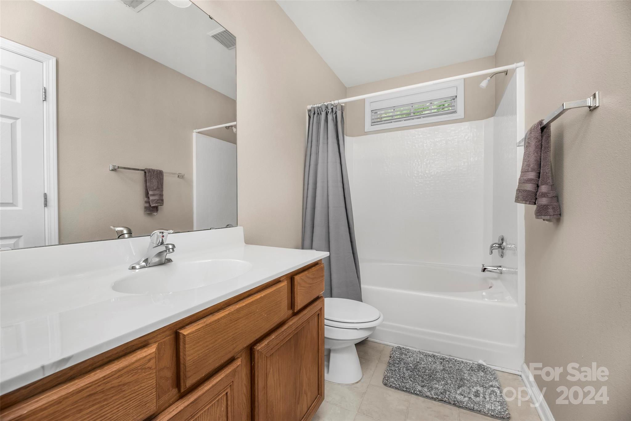 5810 Fox Ridge Lane Winston-Salem, NC 27104 - Photo 25 of 30 a bathroom with a sink a toilet and shower