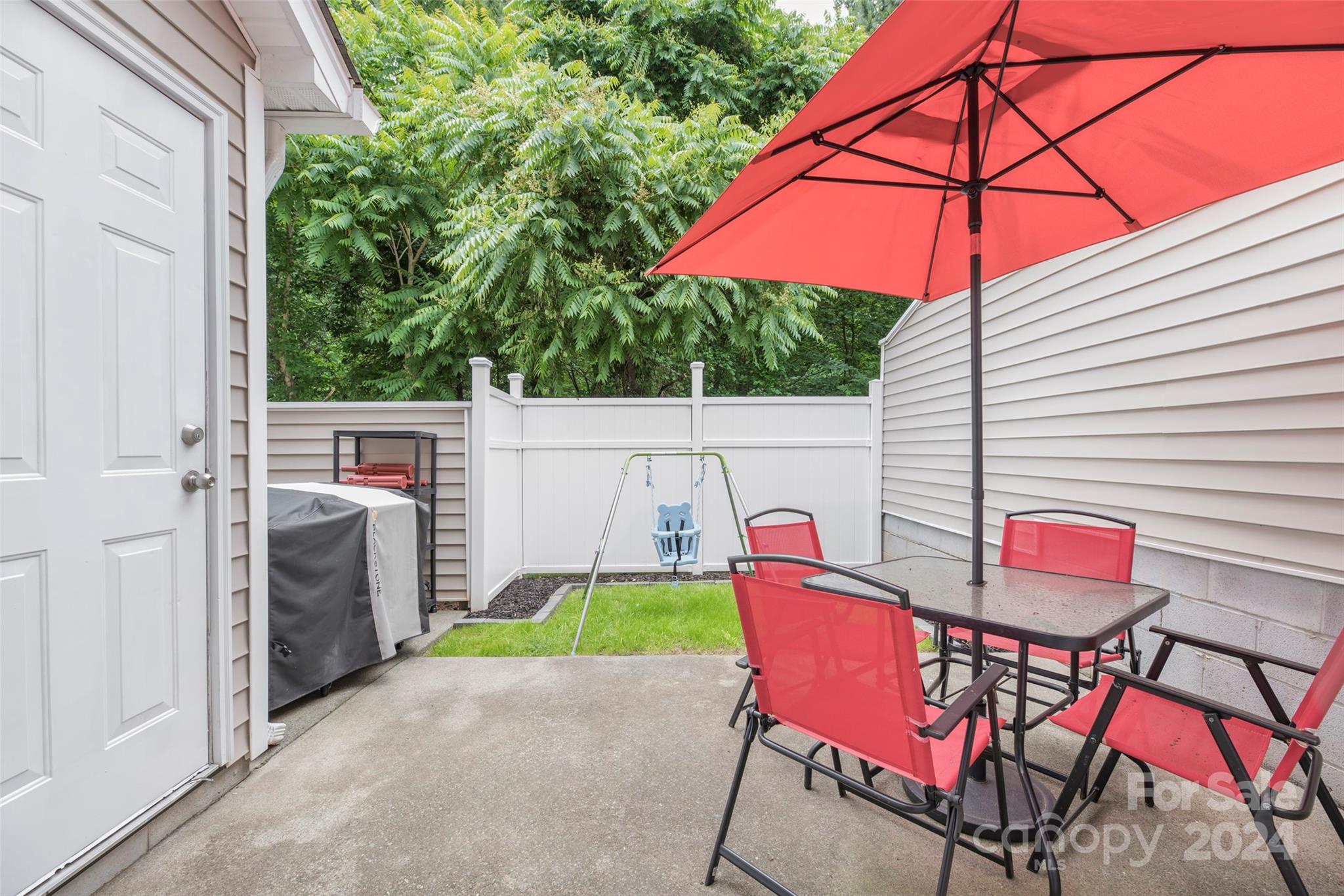 5810 Fox Ridge Lane Winston-Salem, NC 27104 - Photo 27 of 30 a view of an outdoor sitting area with furniture and backyard