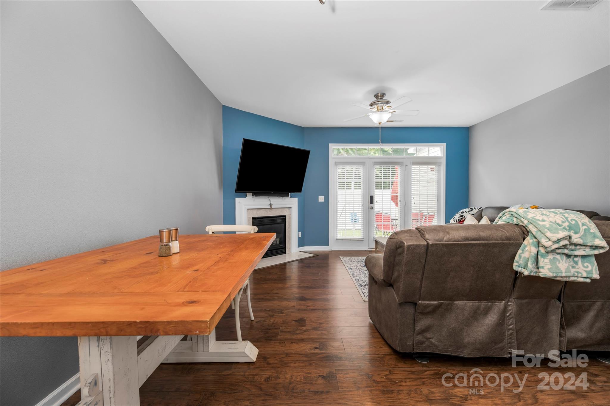 5810 Fox Ridge Lane Winston-Salem, NC 27104 - Photo 10 of 30 a living room with furniture and a flat screen tv