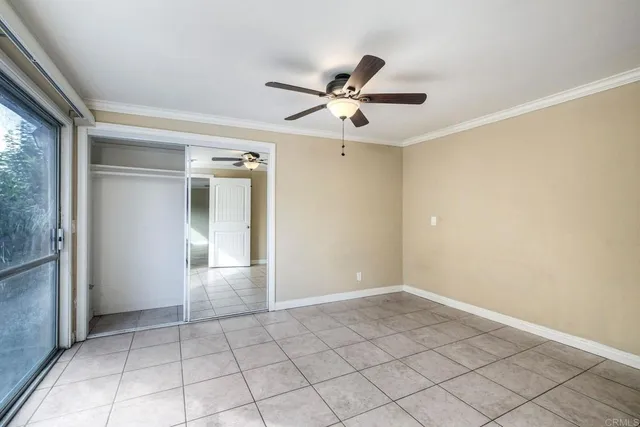 a view of an empty room and window
