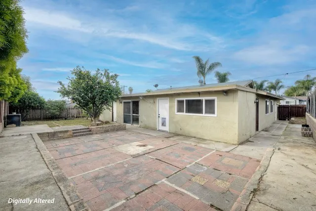 a view of a house with a patio