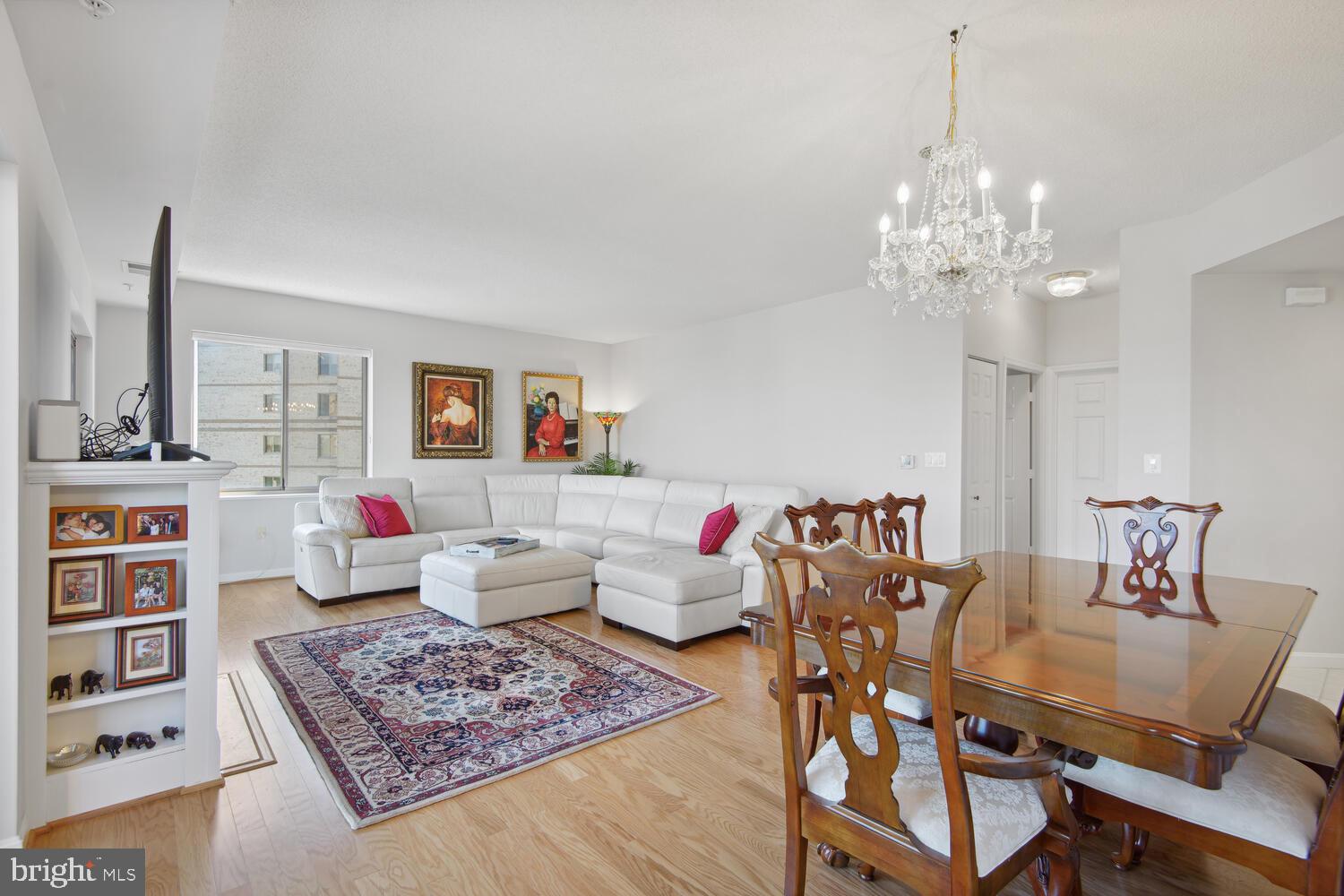 19375 Cypress Ridge Terrace, Unit 607 Leesburg, VA 20176 - Photo 11 of 30 View from kitchen to dining room and living room