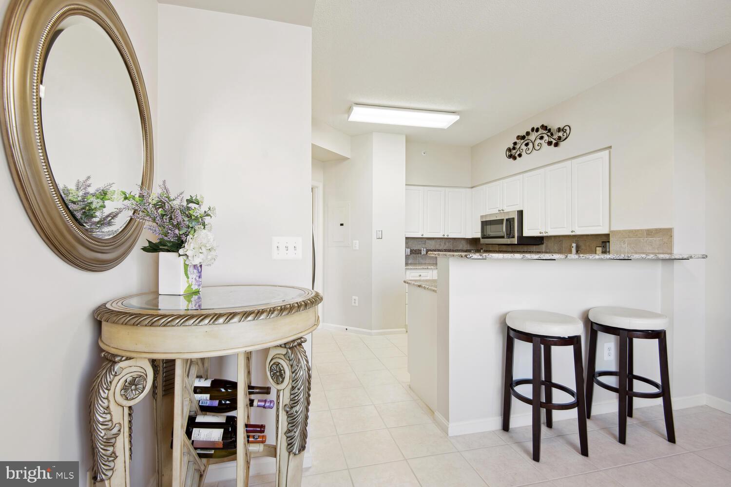 19375 Cypress Ridge Terrace, Unit 607 Leesburg, VA 20176 - Photo 18 of 30 View into kitchen for kitchen table space