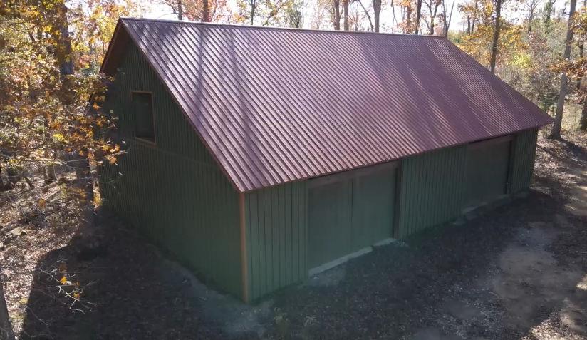 400 Kitchens Mountain Road Northwest Cartersville, GA 30120 - Photo 6 of 32 a view of a backyard with a large tree