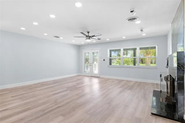 a view of kitchen with wooden floor and window