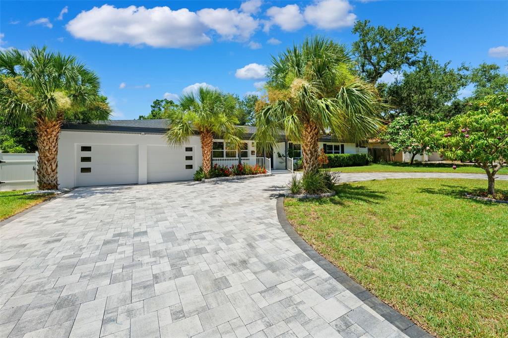 8231 31st Terrace North St. Petersburg, FL 33710 - Photo 31 of 55 a view of a backyard with palm trees
