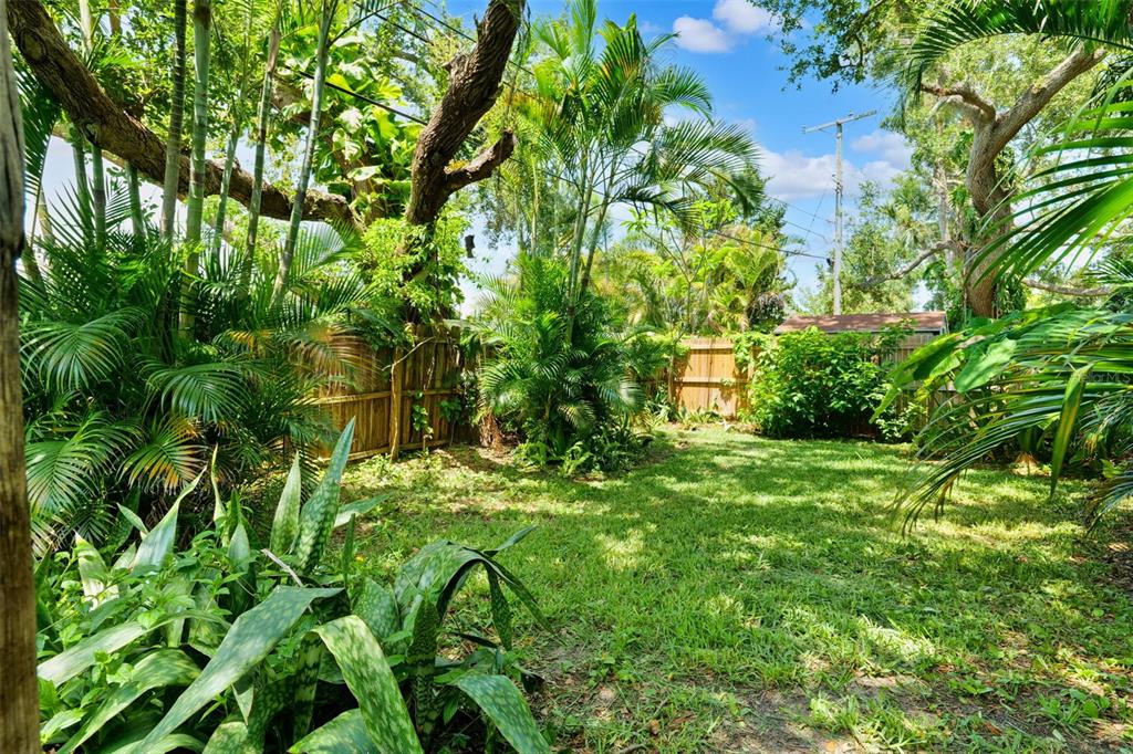 8231 31st Terrace North St. Petersburg, FL 33710 - Photo 45 of 55 a backyard of a house with lots of green space