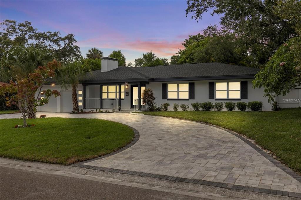 8231 31st Terrace North St. Petersburg, FL 33710 - Photo 53 of 55 front view of a house with a yard