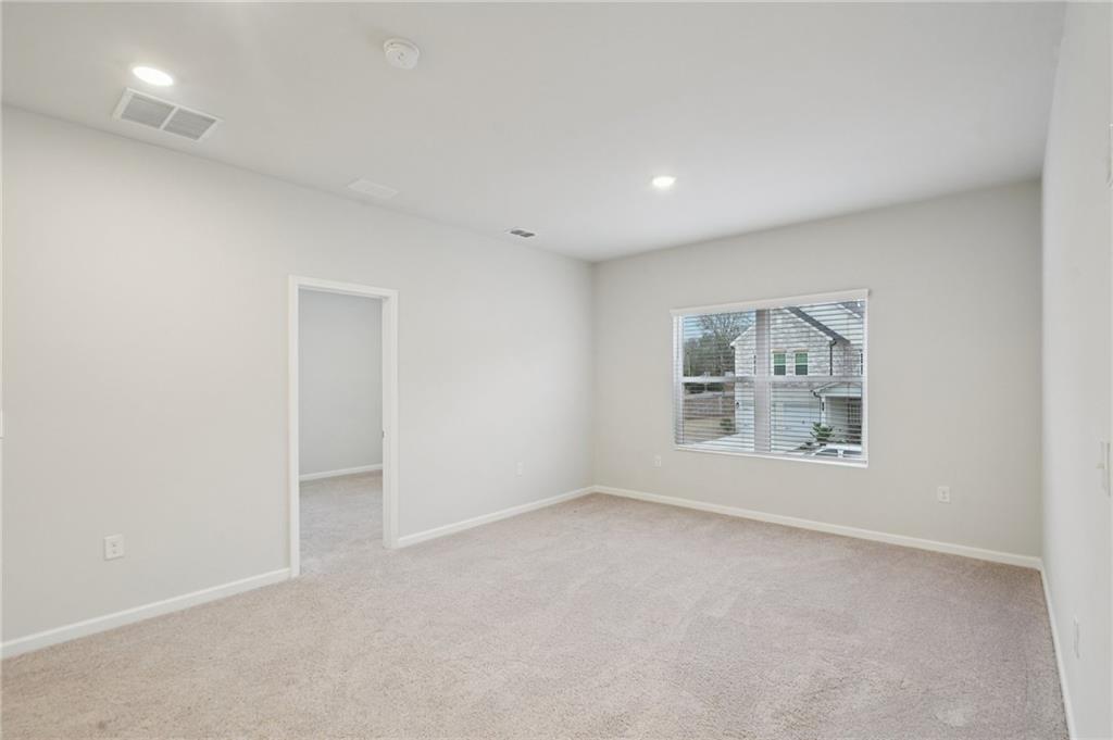 2101 Ecoland Drive Grayson, GA 30017 - Photo 13 of 26 an empty room with a empty space and window