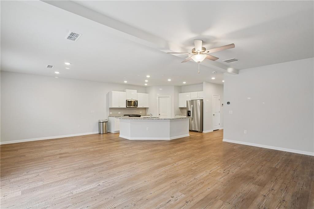 2101 Ecoland Drive Grayson, GA 30017 - Photo 4 of 26 a view of kitchen with kitchen island a sink and appliances