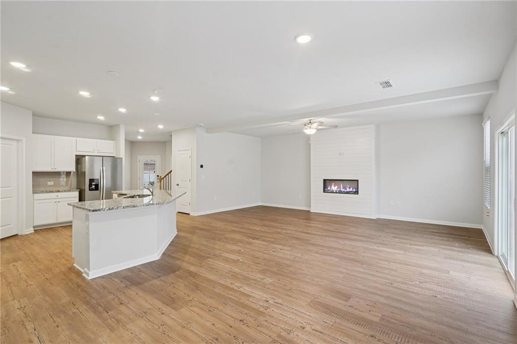 2101 Ecoland Drive Grayson, GA 30017 - Photo 7 of 26 a view of kitchen with sink microwave and stove