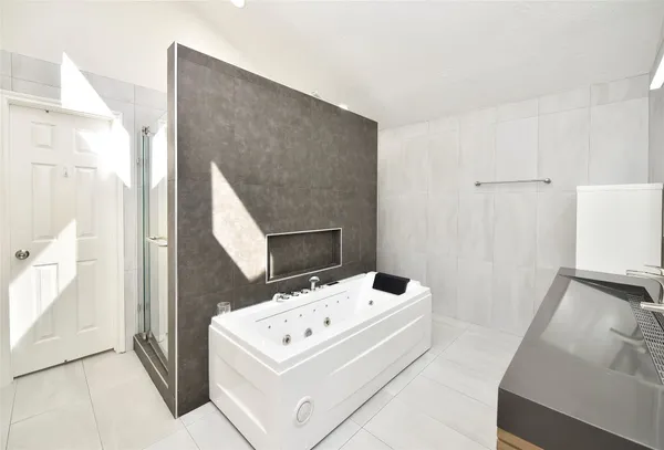 a bathroom with a sink and mirror