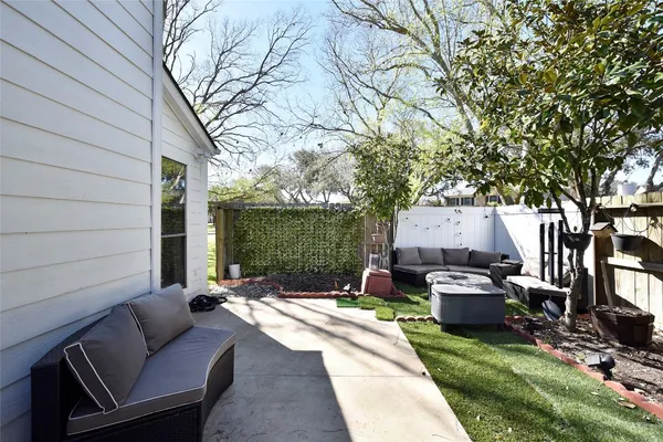 a backyard of a house with seating space