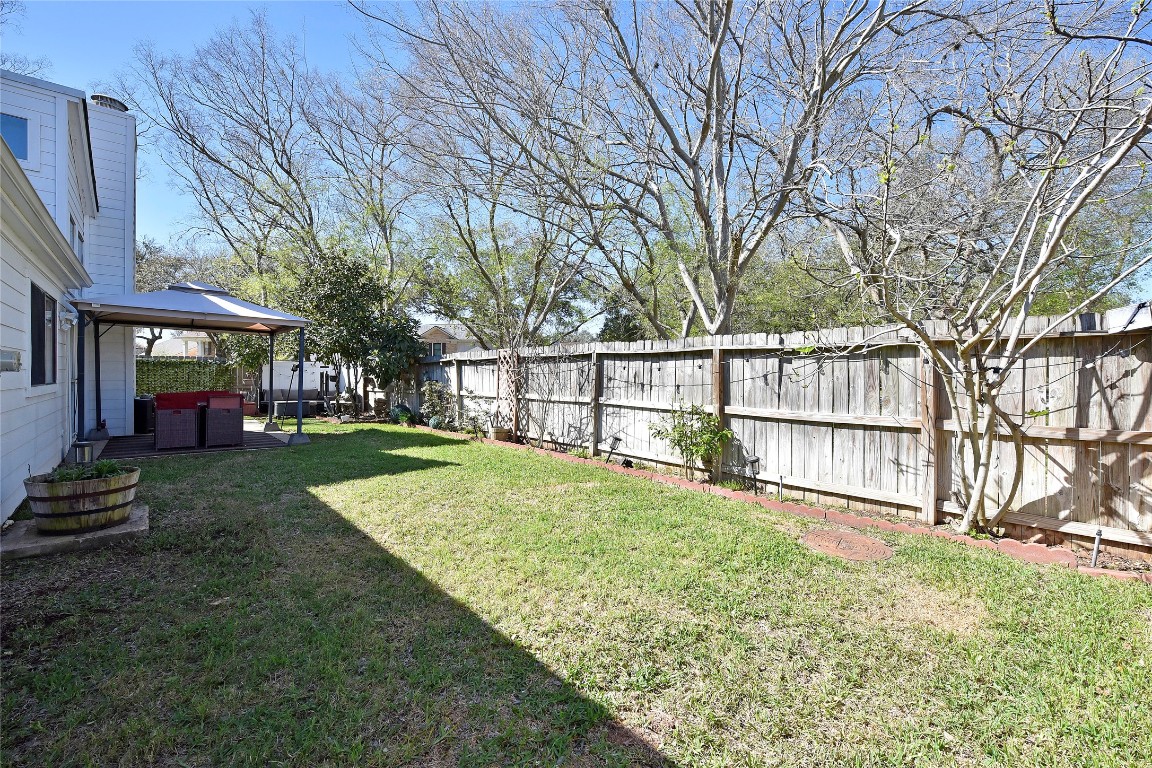 3203 East Rangecrest Place Sugar Land, TX 77479 - Photo 34 of 36 a view of a house with a yard