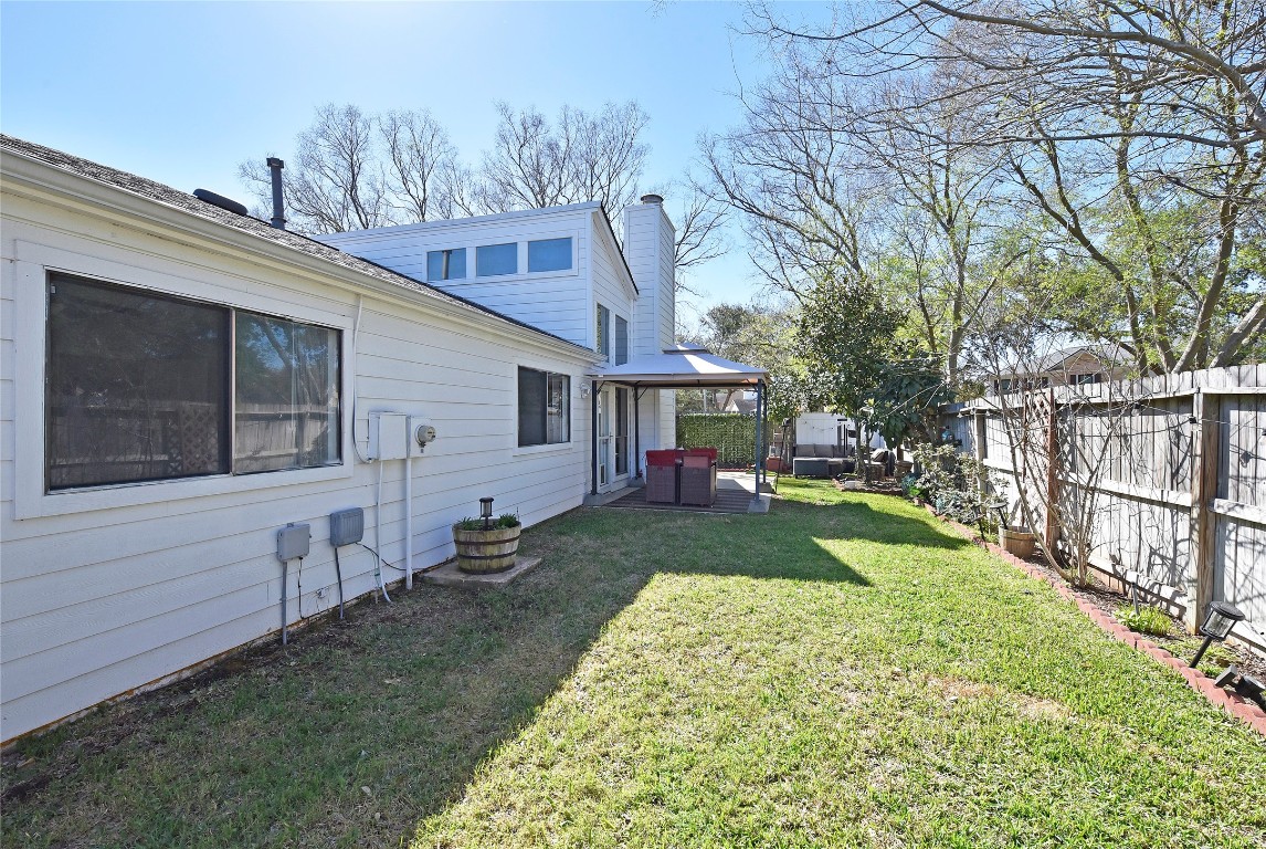3203 East Rangecrest Place Sugar Land, TX 77479 - Photo 35 of 36 a view of a house with a yard
