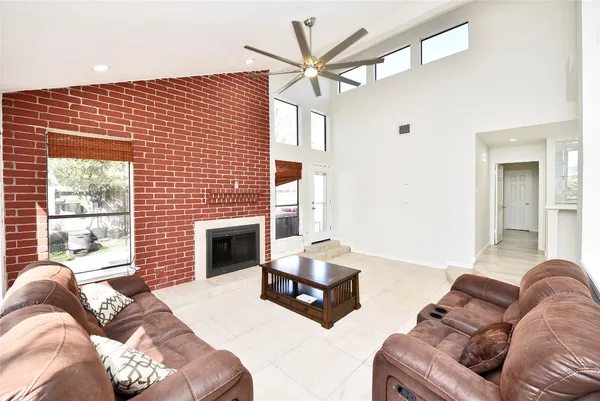 a bedroom with furniture or bed and a fireplace