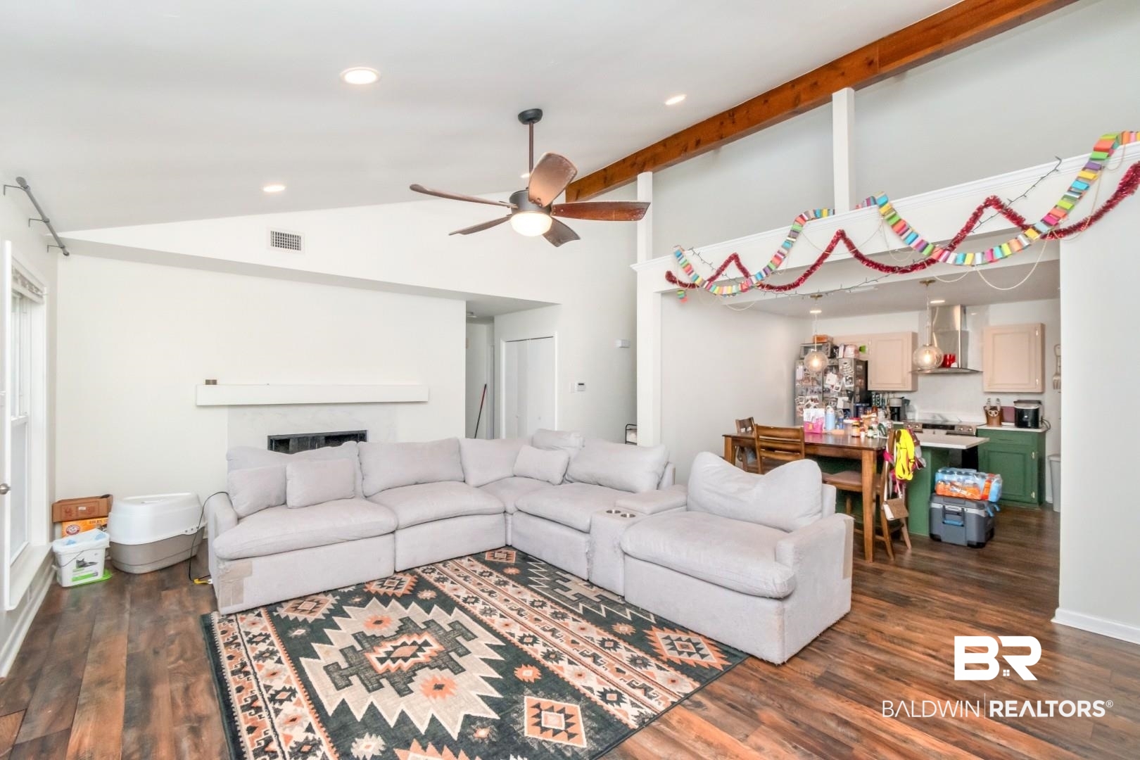 6208 Cottage Hill Road Mobile, AL 36609 - Photo 4 of 20 Living room with ceiling fan, lofted ceiling, dark wood-type flooring, recessed lighting, and a fireplace