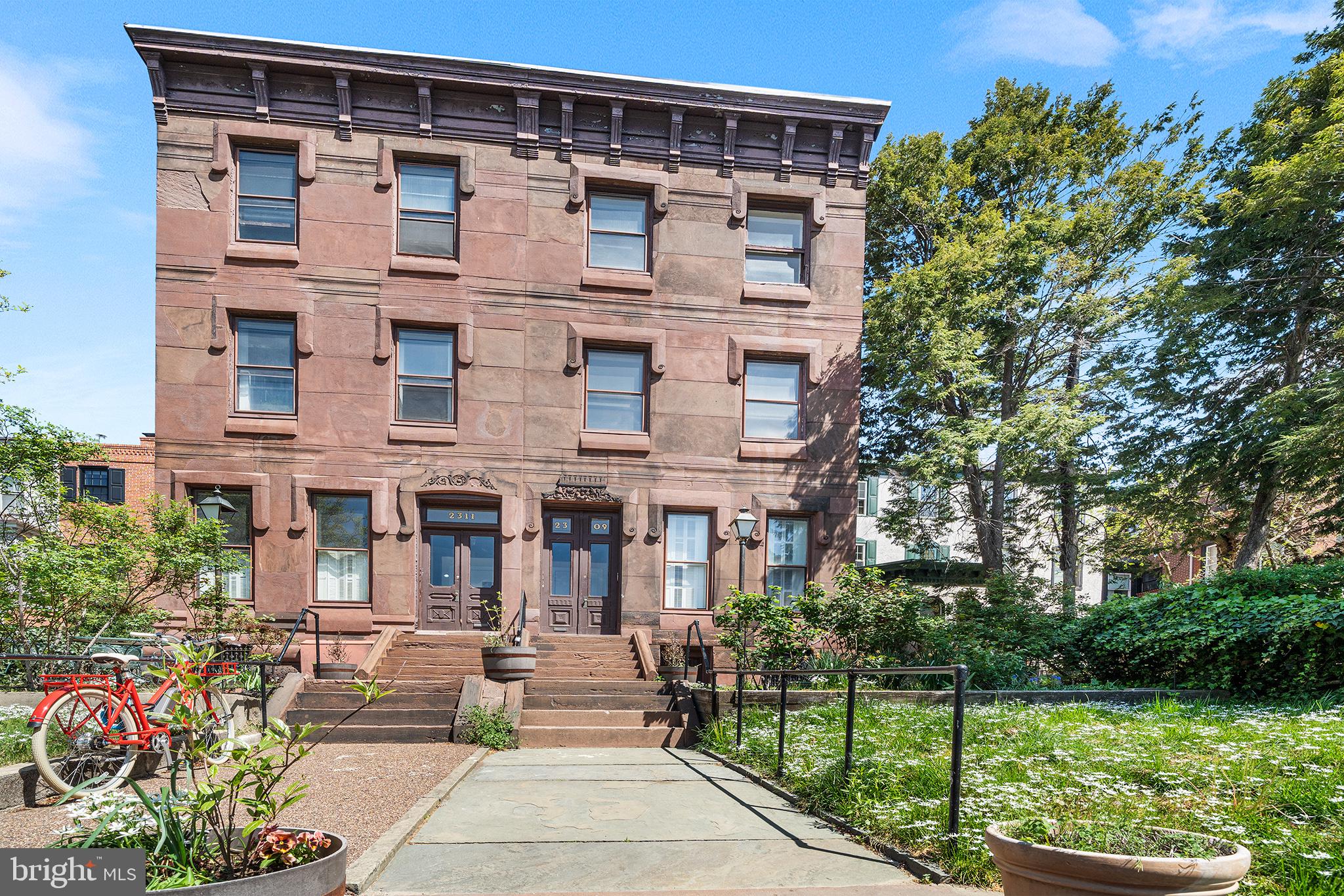 2309 Green Street, Unit 2R Philadelphia, PA 19130 - Photo 11 of 15 a front view of a building with garden