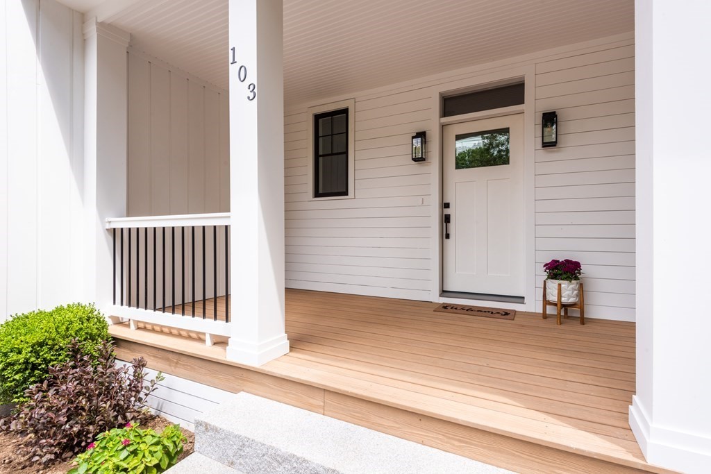a view of a porch with a bench