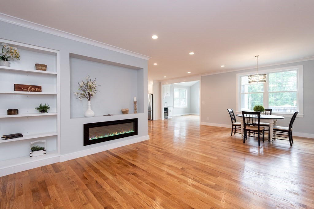 103 Francis Wyman Road Burlington, MA 01803 - Photo 13 of 42 a living room with furniture and a wooden floor