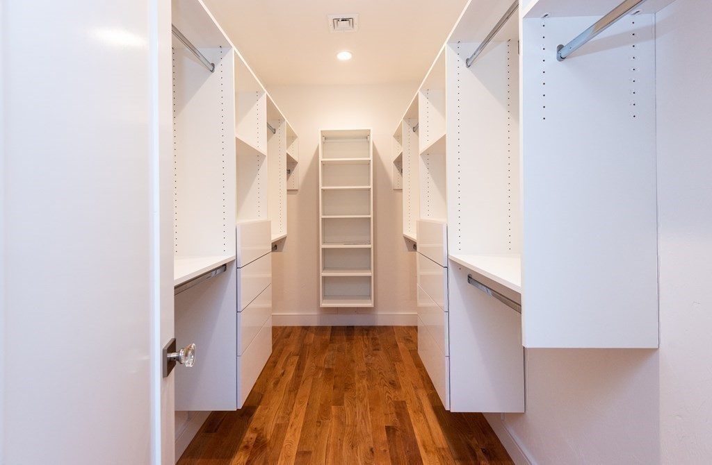 103 Francis Wyman Road Burlington, MA 01803 - Photo 24 of 42 a view of walk in closet with empty racks