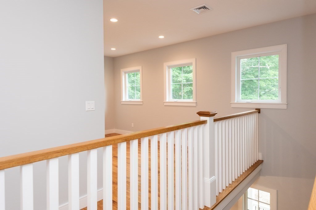 103 Francis Wyman Road Burlington, MA 01803 - Photo 29 of 42 a view of a hallway with windows