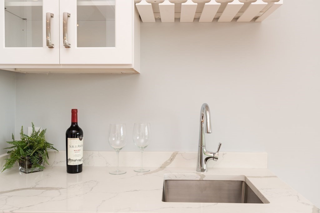 103 Francis Wyman Road Burlington, MA 01803 - Photo 9 of 42 a bathroom with a sink and a mirror