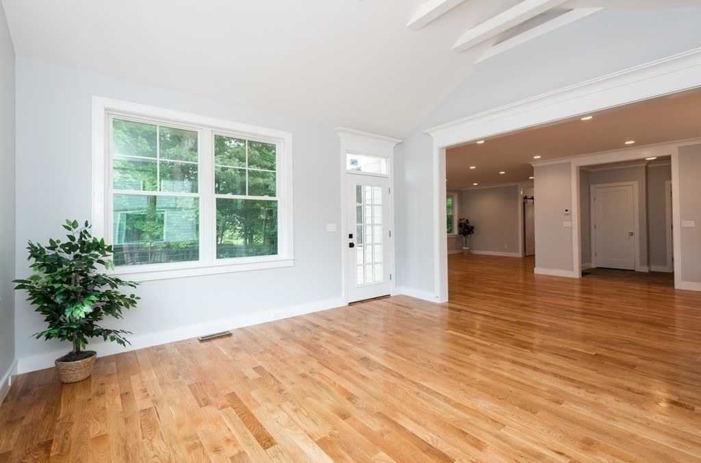 103 Francis Wyman Road Burlington, MA 01803 - Photo 10 of 42 a view of empty room with wooden floor and potted plant