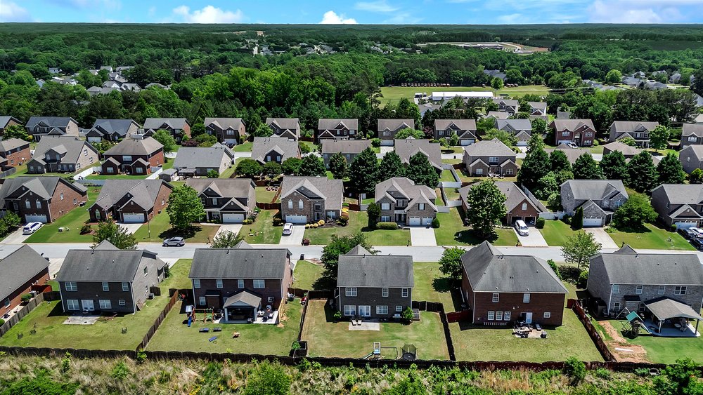 15 Fawn Hill Drive Anderson, SC 29621 - Photo 37 of 38 An aerial perspective reveals a vibrant neighborhood with diverse homes and lush green spaces.