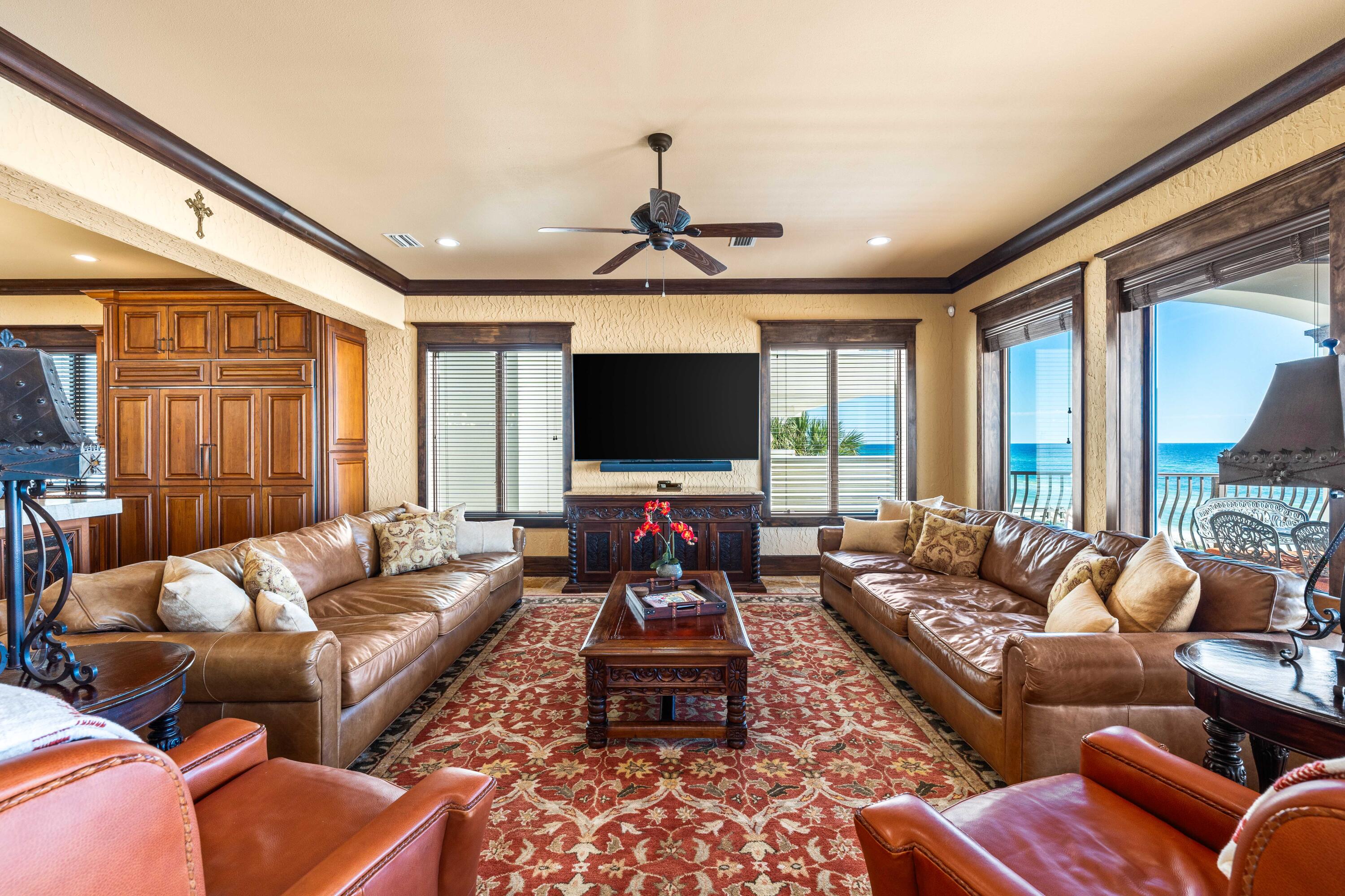 107 Elysee Court Inlet Beach, FL 32461 - Photo 17 of 98 a living room with furniture flat screen tv and a large window