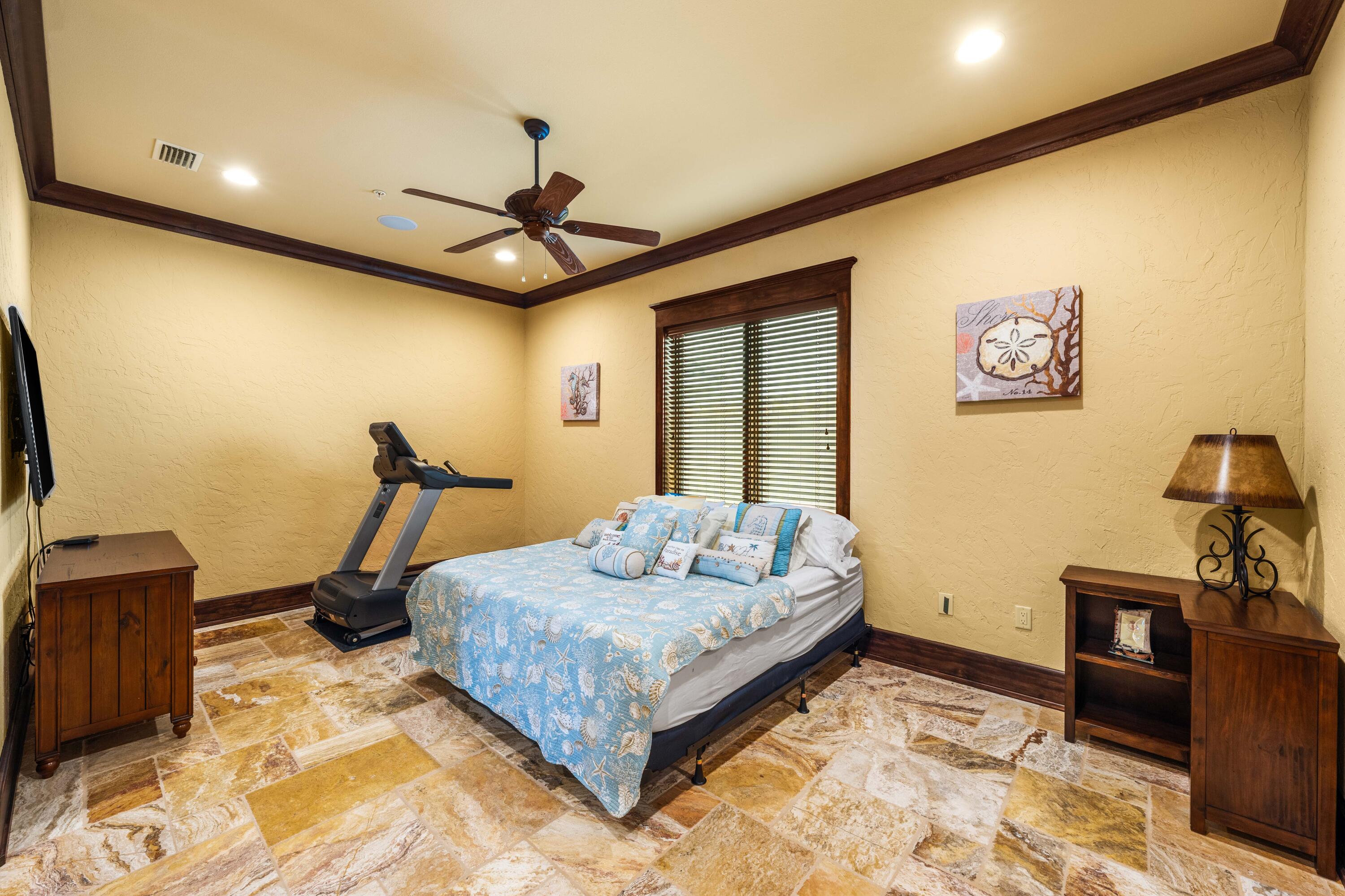 107 Elysee Court Inlet Beach, FL 32461 - Photo 37 of 98 a bedroom with a bed and wooden floor