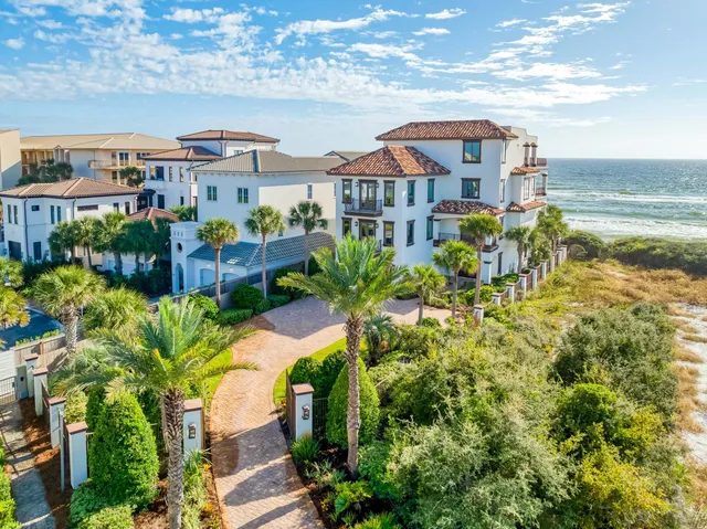 a view of a patio with couches chairs and table in patio