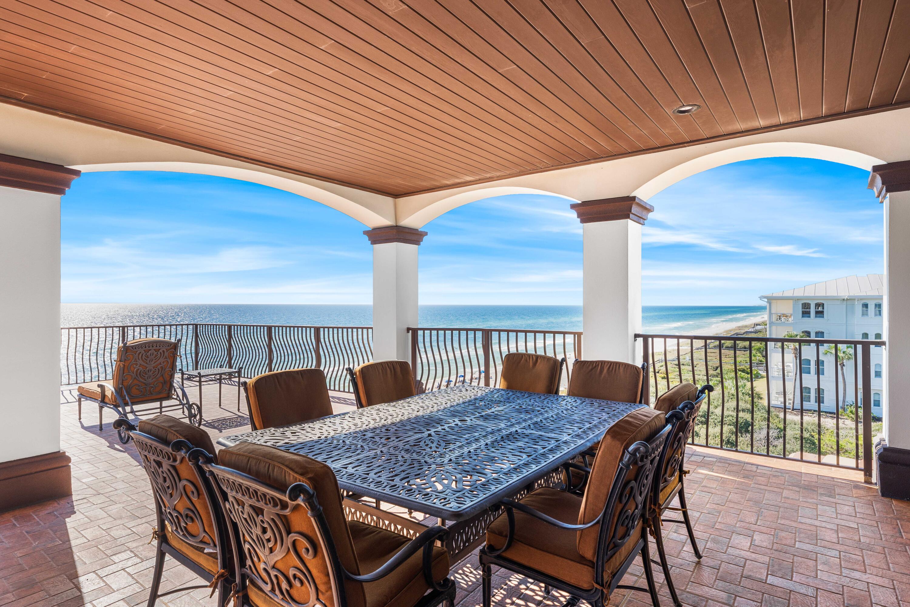 107 Elysee Court Inlet Beach, FL 32461 - Photo 6 of 98 a view of a dining table and chairs in the patio