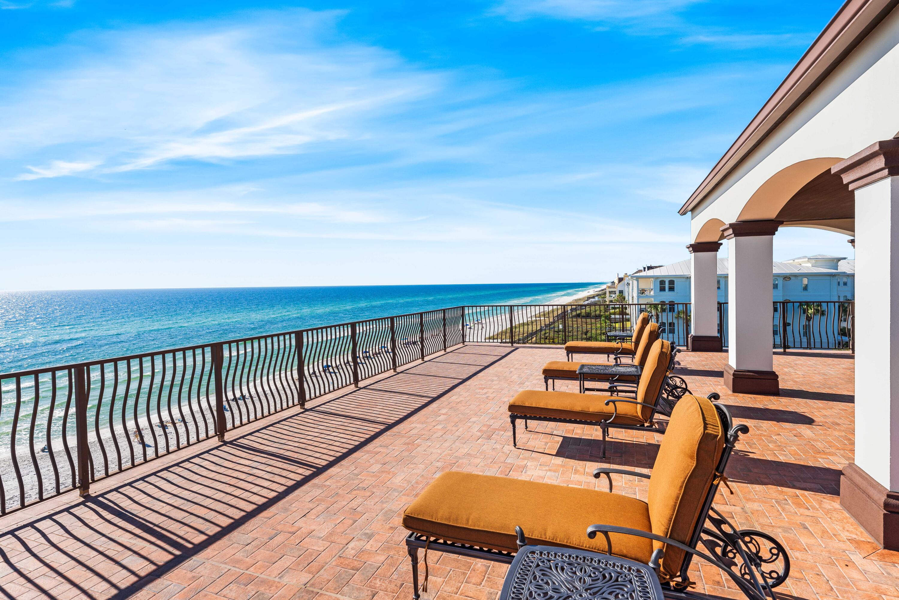 107 Elysee Court Inlet Beach, FL 32461 - Photo 9 of 98 a view of a balcony with wooden floor and outdoor seating