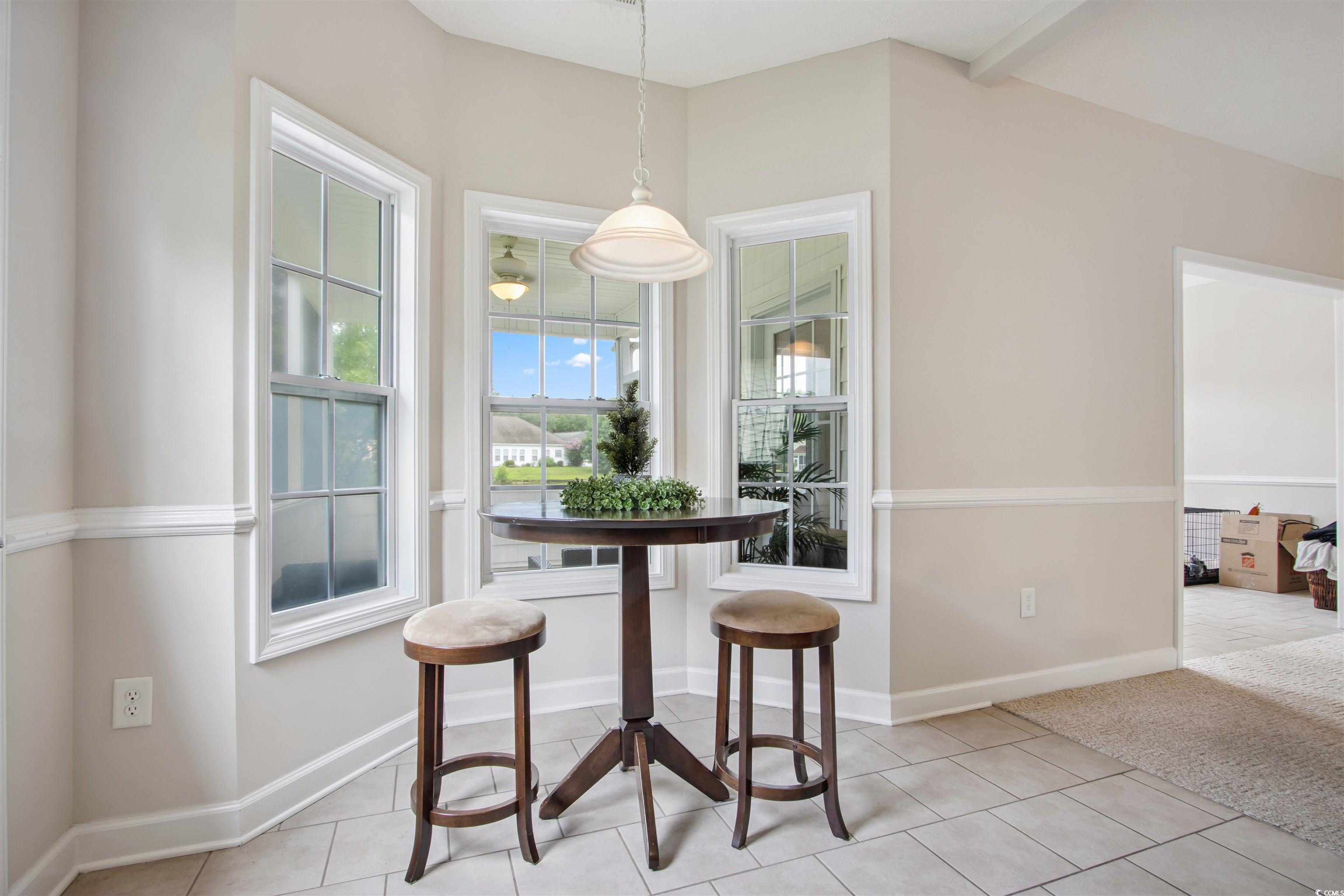Undisclosed Address Conway, SC 29526 - Photo 22 of 26 Dining room with light tile patterned floors and light colored carpet