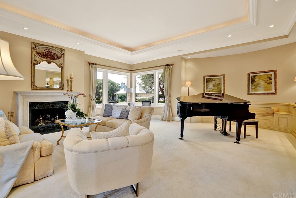 34 Smithcliffs Road Laguna Beach, CA 92651 - Photo 14 of 69 a living room with furniture and a fireplace