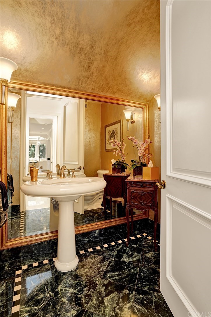 34 Smithcliffs Road Laguna Beach, CA 92651 - Photo 29 of 69 a bathroom with a sink and a mirror