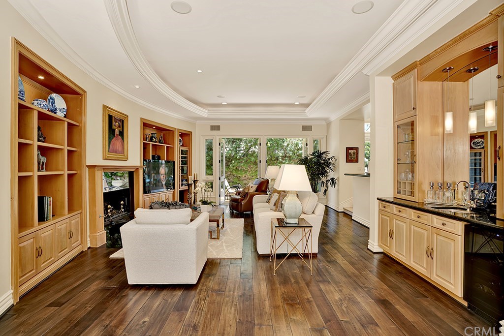 34 Smithcliffs Road Laguna Beach, CA 92651 - Photo 32 of 69 There is a lovely wet bar in the Great Room, complete with a sink, lighted cabinets and a refrigerator.
The new wood flooring is stunning.