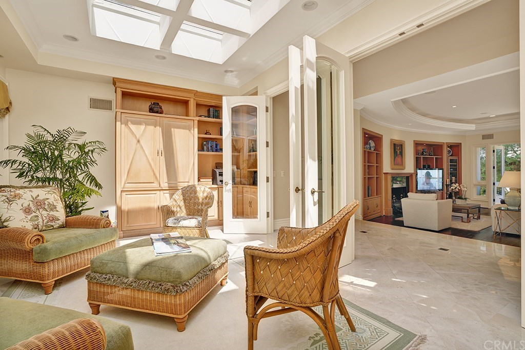 34 Smithcliffs Road Laguna Beach, CA 92651 - Photo 34 of 69 a living room with furniture and a large window