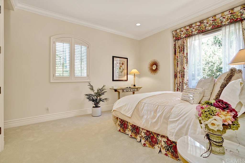 34 Smithcliffs Road Laguna Beach, CA 92651 - Photo 37 of 69 a bedroom with a bed and window