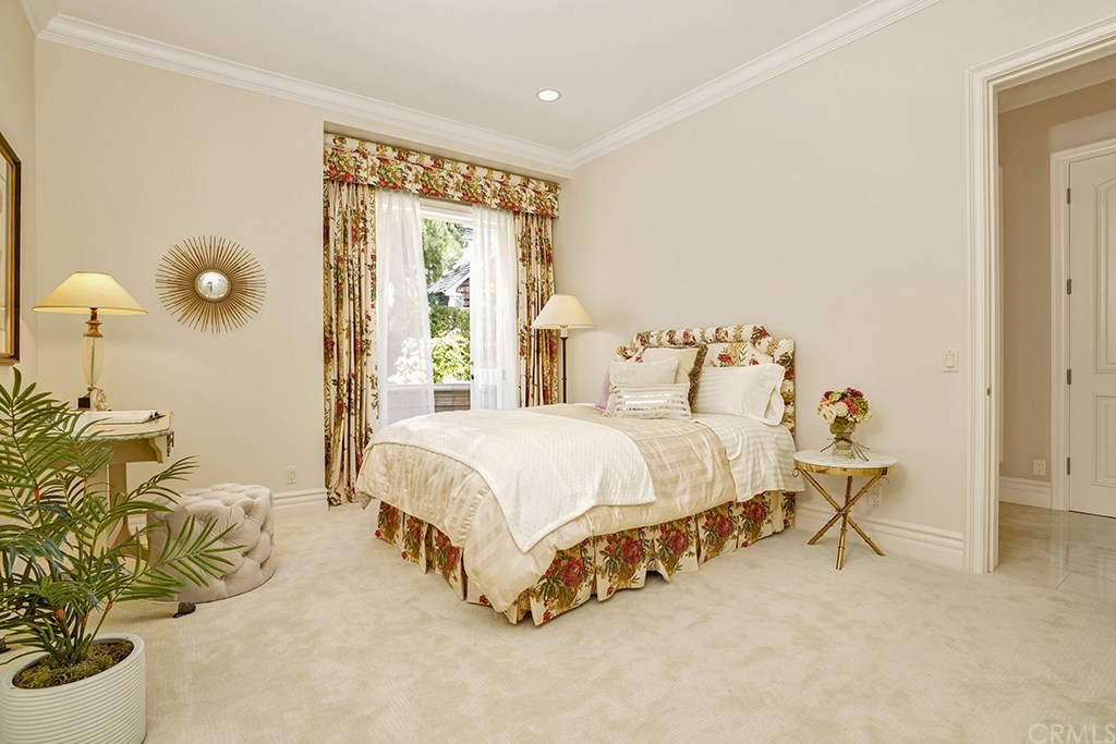 34 Smithcliffs Road Laguna Beach, CA 92651 - Photo 38 of 69 a bed sitting in a bedroom next to a window and work space