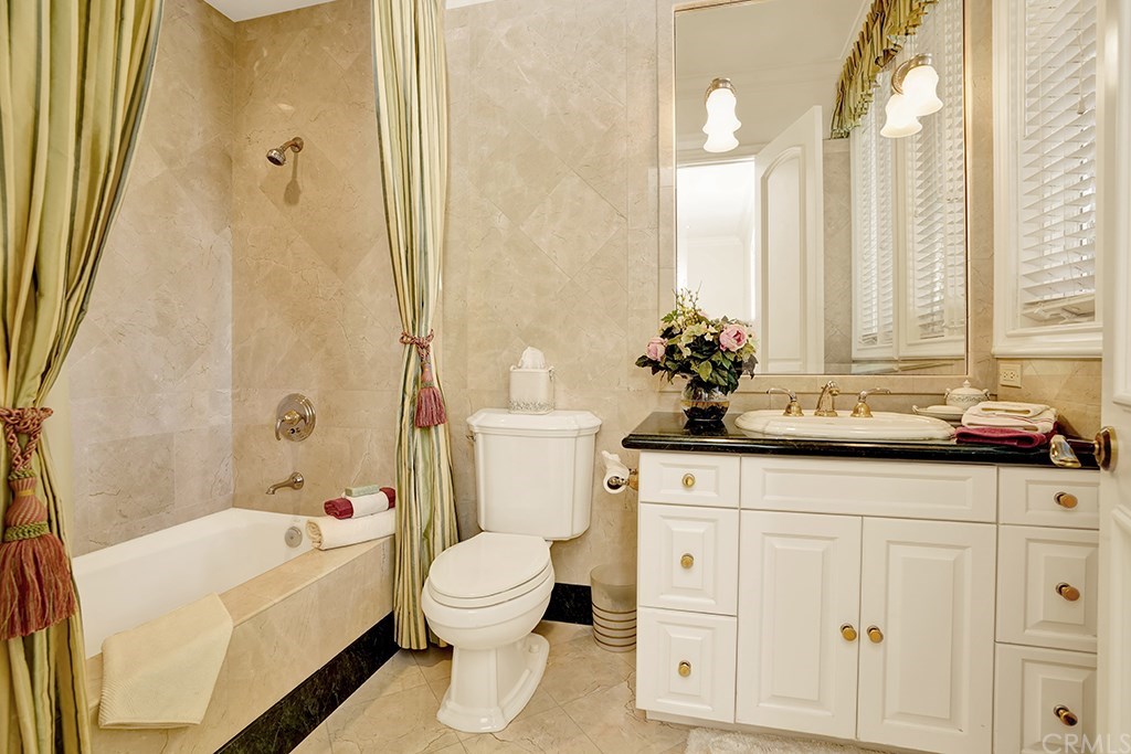 34 Smithcliffs Road Laguna Beach, CA 92651 - Photo 39 of 69 a bathroom with a sink a toilet and bathtub